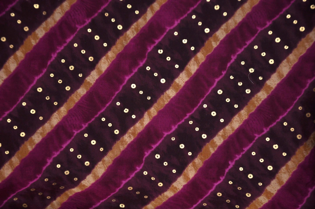 Purple and Gold stripes Muslin Printed Fabric  uploaded by Studio Lcx Fashion Pvt. Ltd. on 6/14/2023