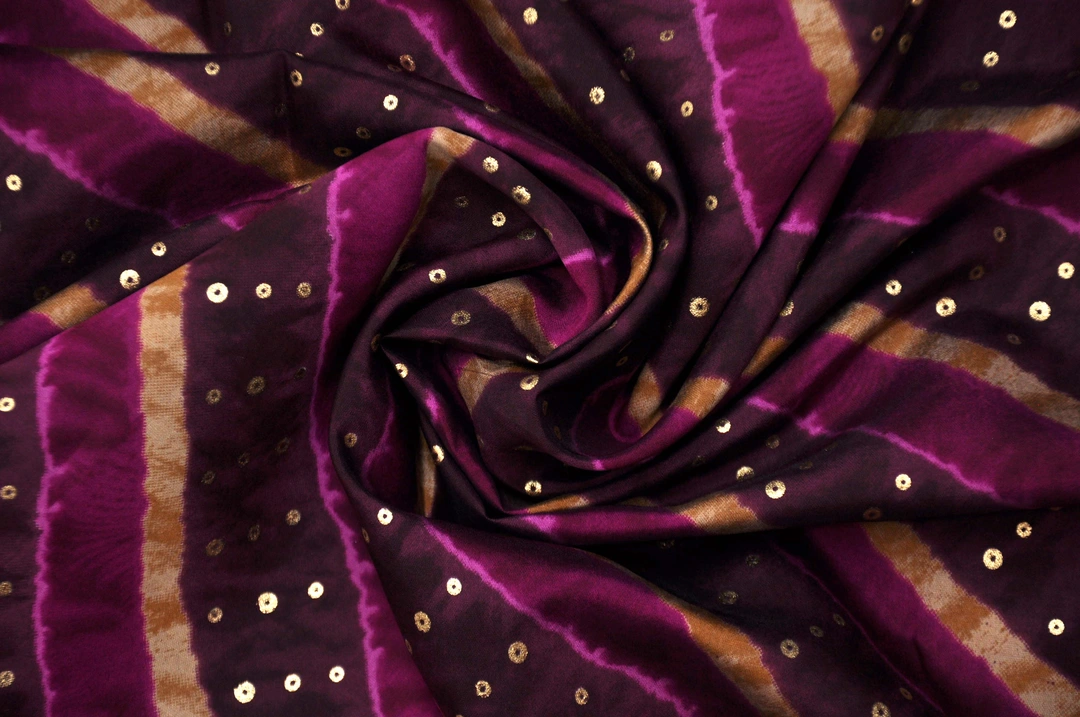 Purple and Gold stripes Muslin Printed Fabric  uploaded by Studio Lcx Fashion Pvt. Ltd. on 6/14/2023