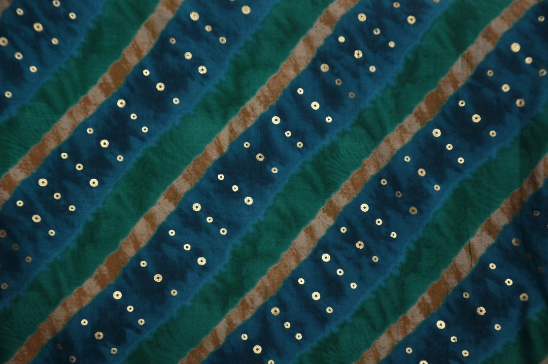 Blue, Green With Gold stripes Muslin Printed Fabric  uploaded by Studio Lcx Fashion Pvt. Ltd. on 6/14/2023