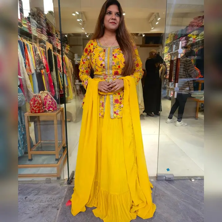 NF-(1039)* *💃 Koti Top Lehenga  💃*

Yellow Colour Embroidered Attractive Party Wear Georgette Top  uploaded by Fashion Textile  on 6/16/2023