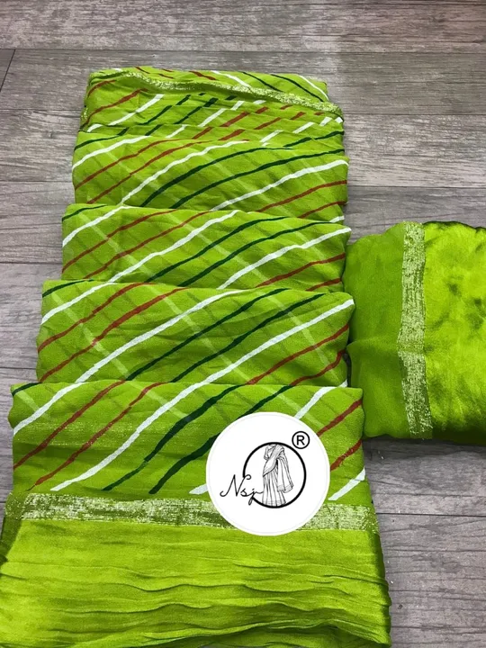 presents very pretty  RANGOLI LEHRIYA saree

beautiful colour combination saree for all ladies 

👉k uploaded by Gotapatti manufacturer on 6/17/2023
