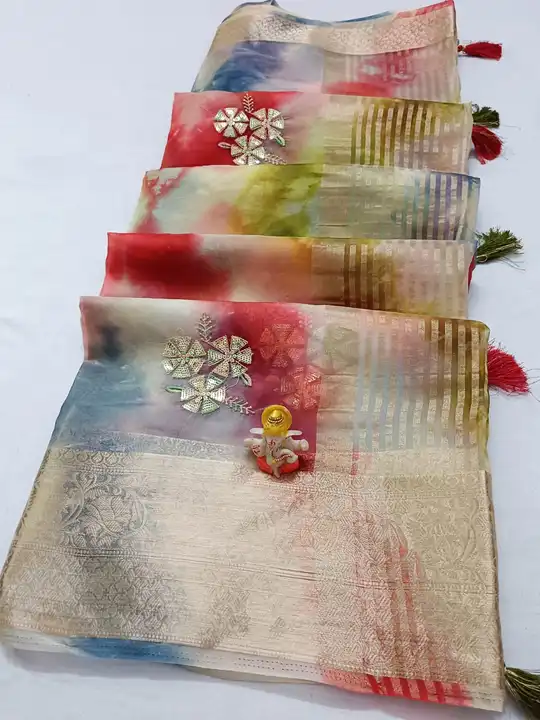 Post image *WE PRESENTS*

Organza saree with attractive  colour combination with multicolour sequence 

Fancy blouse 

Rate - *899/- Only *

*we presents only quality  nothing else*