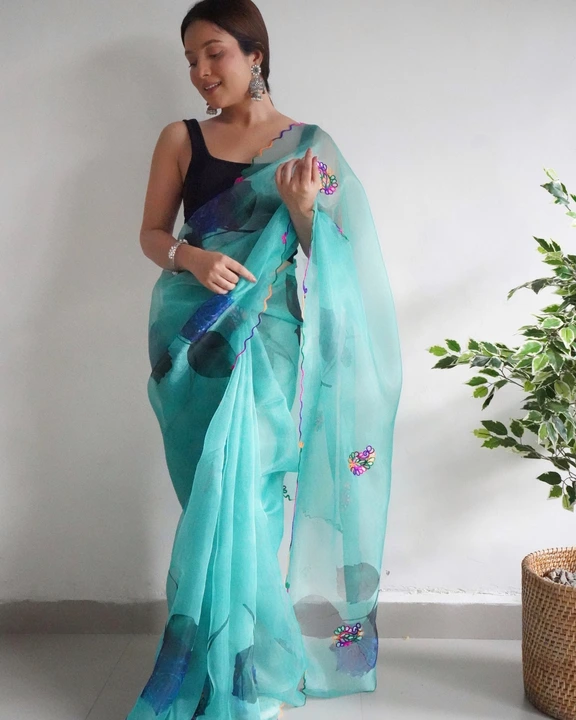 Aqua blue floral printed and cutworked pure organza saree uploaded by Organza mall on 6/17/2023