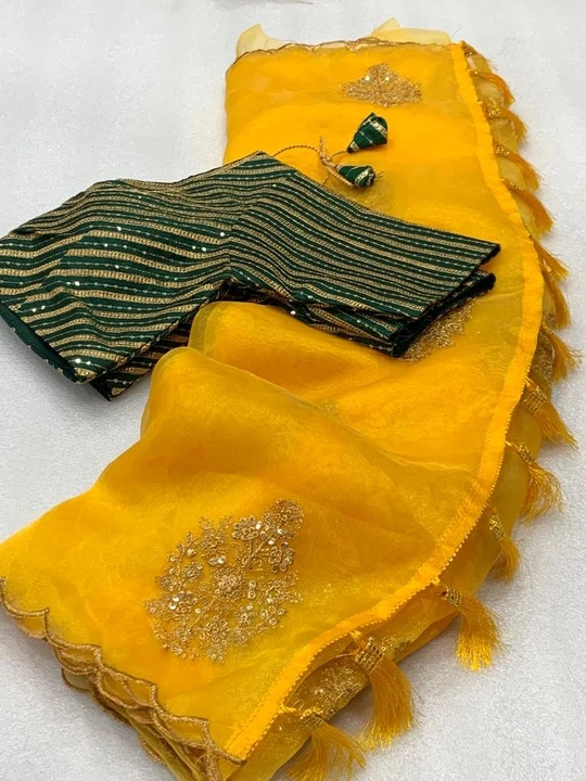 Bollywood Designer Yellow Colored Organza Silk Embroidered Saree With Banglori Silk Worked Blouse  uploaded by Celeb Styles on 6/21/2023