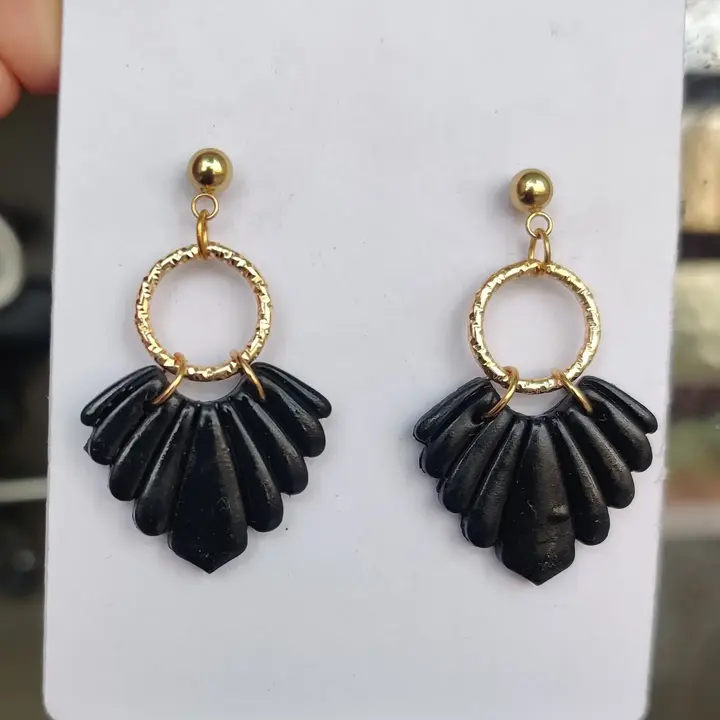 Black and golden combination stud earring  uploaded by Elegant Gallery on 6/21/2023