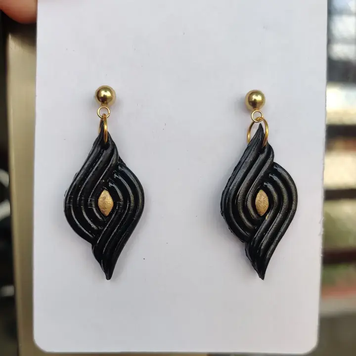 Black and golden combination stud earring  uploaded by Elegant Gallery on 6/21/2023