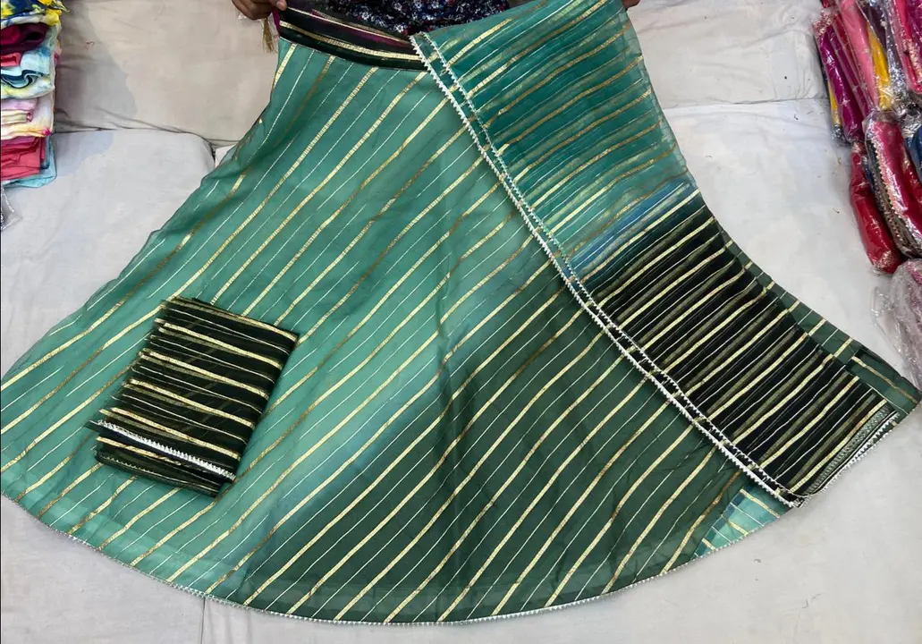 Stock cliyar sale price 
New design launch. 
Fabric organza silk lurex lehnga 
Four die concept Blou uploaded by Gota Patti manufacturing on 6/21/2023