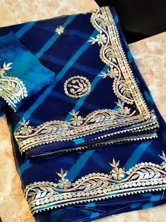 Fabric organja lehriya saree 💕 with hevi gottapatti work 
With blouse  uploaded by Gotapatti manufacturer on 6/22/2023