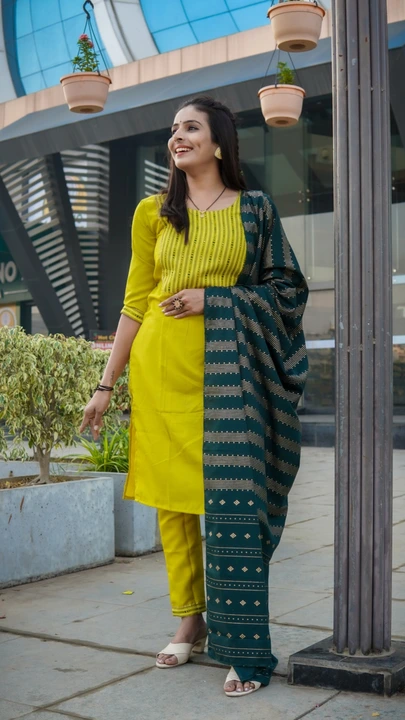 Ethnic Elegance Cotton Blend Yellow Color Kurti With Bottom and Dupatta uploaded by Celeb Styles on 6/22/2023