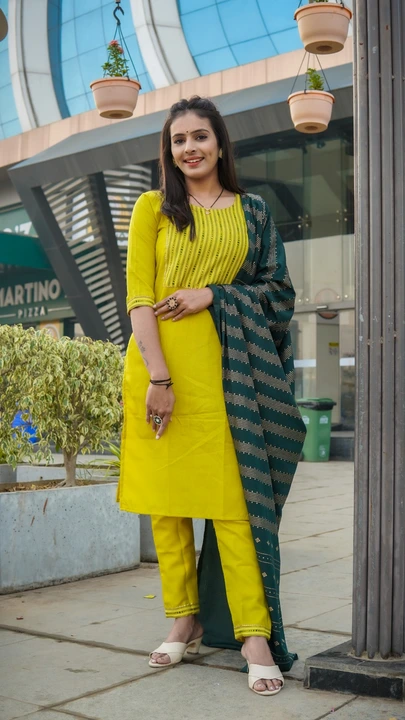 Ethnic Elegance Cotton Blend Yellow Color Kurti With Bottom and Dupatta uploaded by Celeb Styles on 6/22/2023