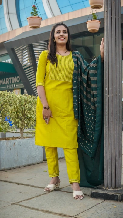 Ethnic Elegance Cotton Blend Yellow Color Kurti With Bottom and Dupatta uploaded by Celeb Styles on 6/22/2023