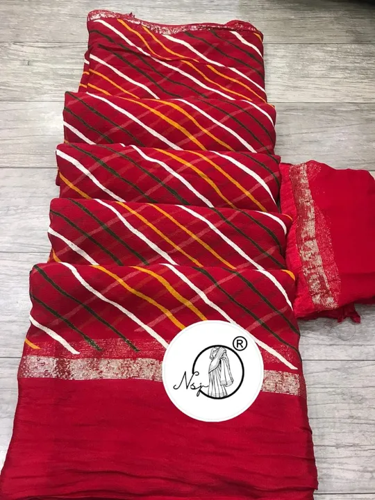 presents very pretty  RANGOLI LEHRIYA saree

beautiful colour combination saree for all ladies 

👉k uploaded by Gotapatti manufacturer on 6/23/2023