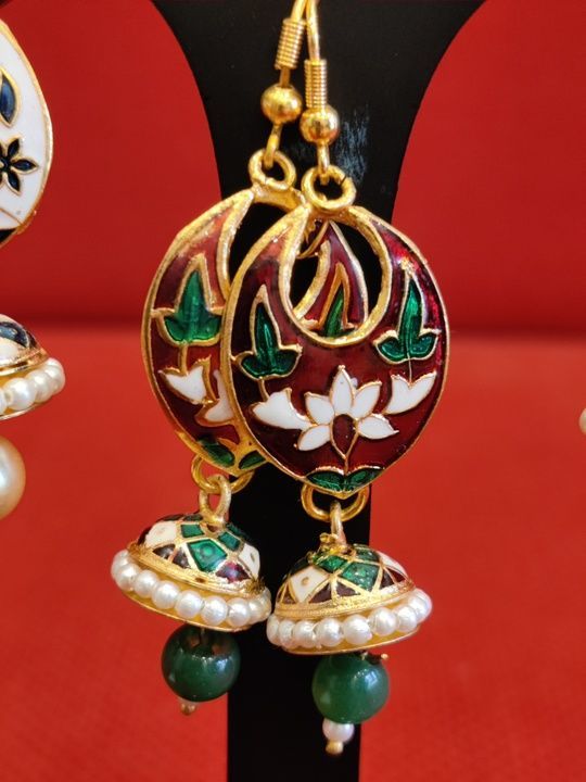 Oval shaped Meenakari Jhumki with single pearl drop uploaded by Dhanwantri jewels on 3/14/2021