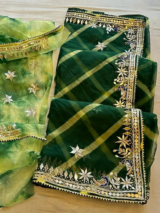 Fabric organja lehriya saree 💕
With blouse price only 1350+$ uploaded by Gota Patti manufacturing on 6/23/2023