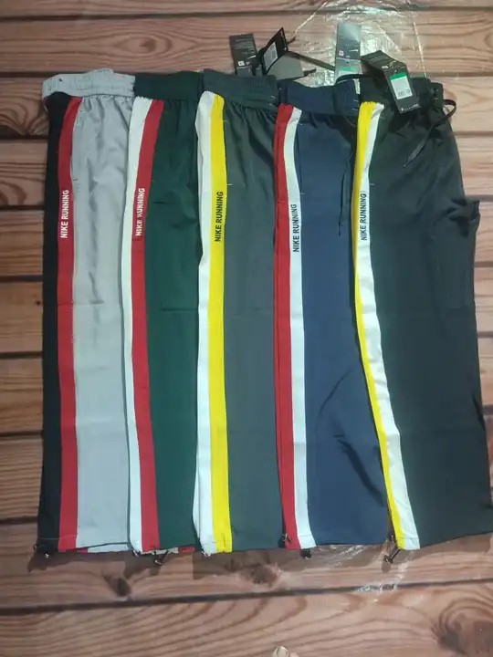 Nike ns lycra trackpants for mens  uploaded by Shrey creation  on 6/24/2023