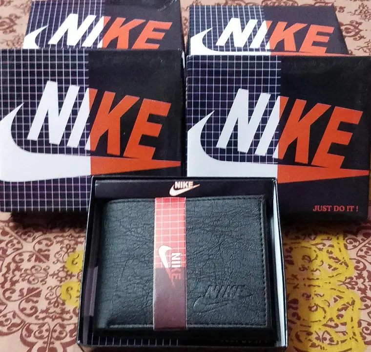 Nike wallet uploaded by Essential Mart on 6/24/2023