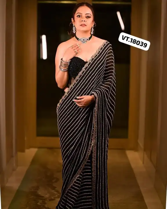 SUPERHIT CELEBRITY STYLE SEQUENCE SAREE COLLECTION

*👇DETAILS 👇*

*VT.18039*

*SAREE FABRIC :* Hea uploaded by business on 6/26/2023