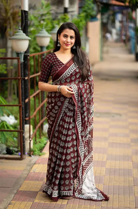soft georgette printed saree with aaari mirror work and piping border uploaded by DHANLAXMI Fashion on 6/27/2023