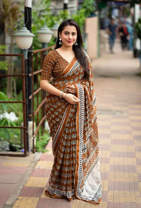 soft georgette printed saree with aaari mirror work and piping border uploaded by DHANLAXMI Fashion on 6/27/2023