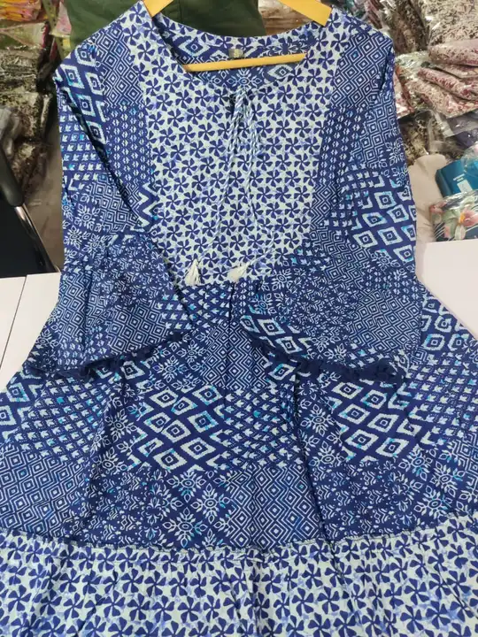 Beautiful stylish 1 pc dress fully fleired with balloon sleeves with pom pom less
 book your attire  uploaded by JAIPURI FASHION HUB on 6/28/2023