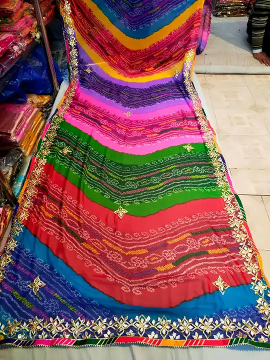 special  Georgette fabric of bhandej   saree*🌹🌹 nauranga color matching

👌👌 *Beautiful  hand  Go uploaded by Gota Patti manufacturing on 6/29/2023