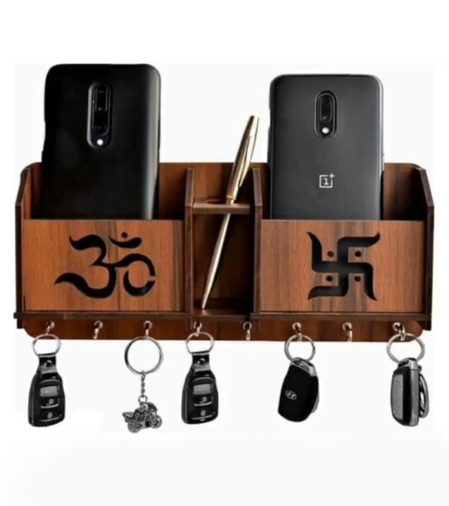 Key holder om swastik decoration item phone stand key hooks uploaded by business on 7/2/2023
