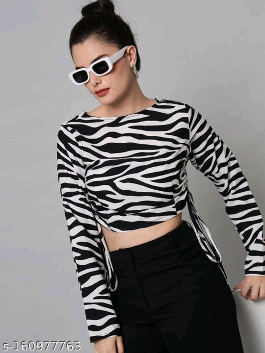 Zebra printed top uploaded by business on 7/2/2023