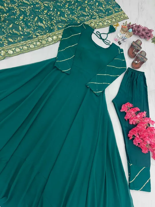 👗*Launching New Party Wear Look Gown,Dupatta & Bottom Set *👗

*PD-1025*

🧵*FABRIC DETAILS*🧵👇

* uploaded by Ahmed fashion on 7/3/2023