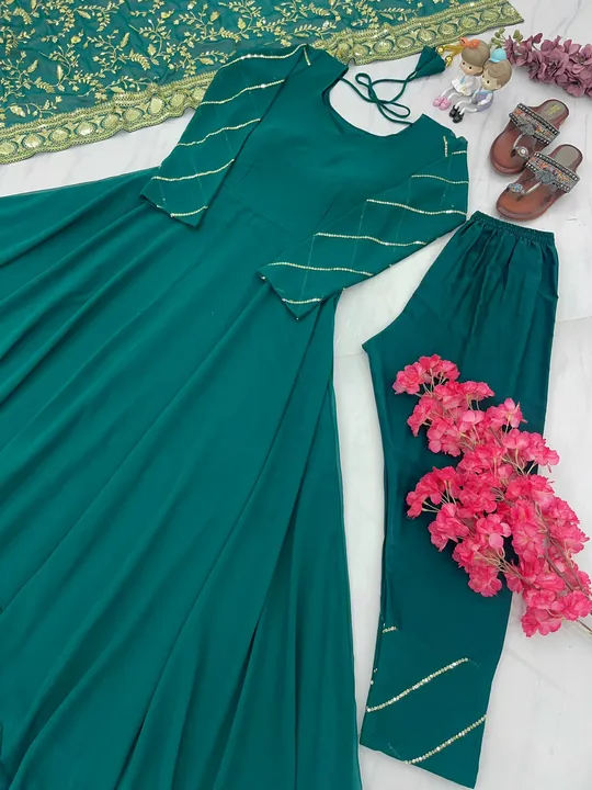 👗*Launching New Party Wear Look Gown,Dupatta & Bottom Set *👗

*PD-1025*

🧵*FABRIC DETAILS*🧵👇

* uploaded by Ahmed fashion on 7/3/2023