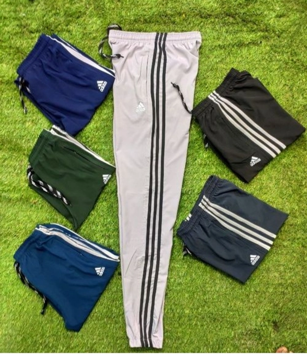 Ns laycra track pants adidas joggers lock side strip multi colored size.M.L.XL uploaded by Crown sports  on 7/4/2023
