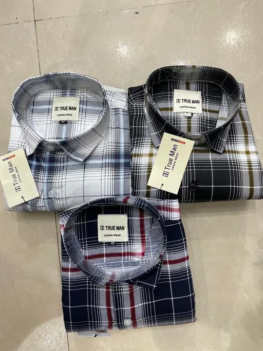 Check shirt uploaded by business on 7/7/2023