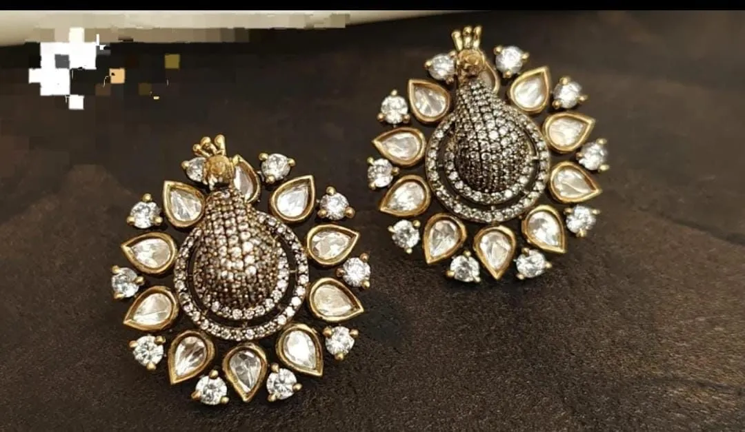 Good quality peacock studs with foil stones uploaded by VARDHAK COLLECTION  on 7/11/2023