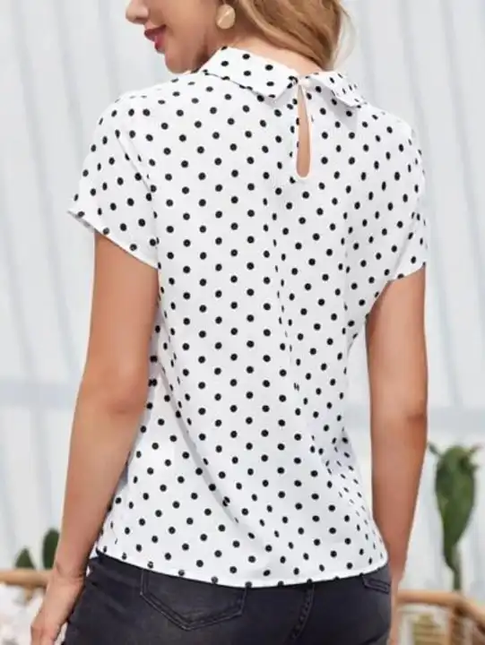 Polka white top for women uploaded by DECISION LELE on 7/12/2023