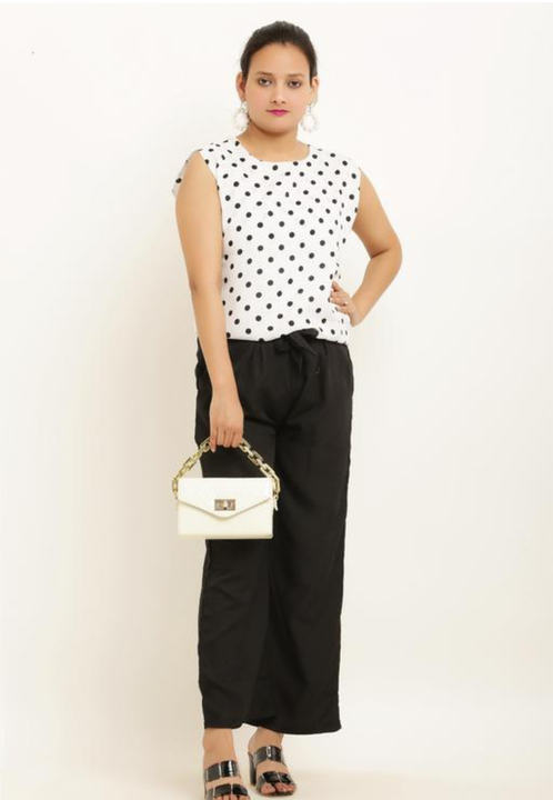 Polka white sleeveless top for women uploaded by business on 7/12/2023