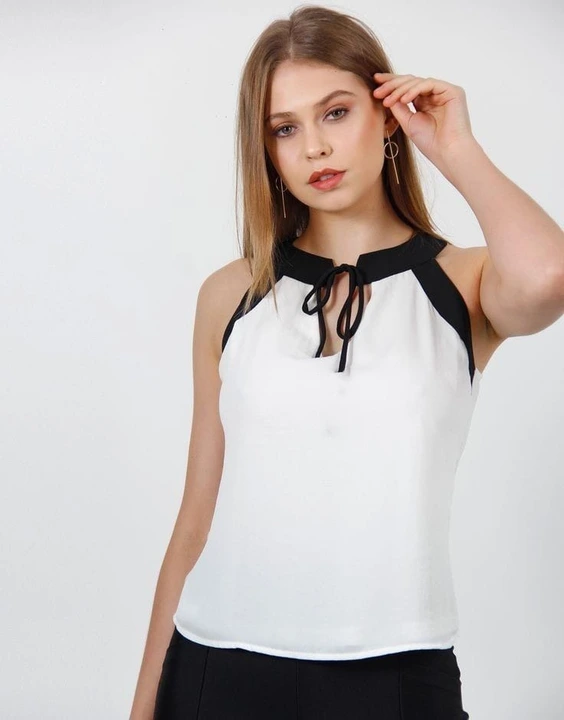 SOLID WHITE SLEEVELESS TOP FOR WOMEN uploaded by DECISION LELE on 7/12/2023