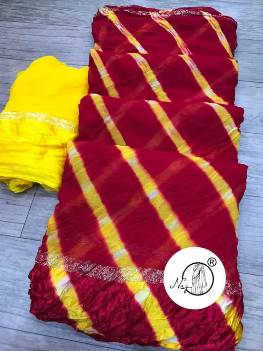 presents lehriya  saree

beautiful colour combination saree for all ladies 

👉keep shopping with us uploaded by Gotapatti manufacturer on 7/15/2023