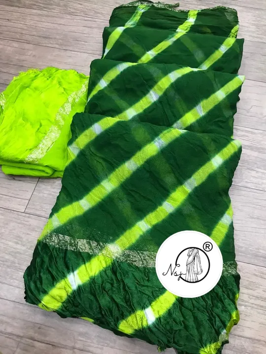 presents lehriya  saree

beautiful colour combination saree for all ladies 

👉keep shopping with us uploaded by Gotapatti manufacturer on 7/15/2023