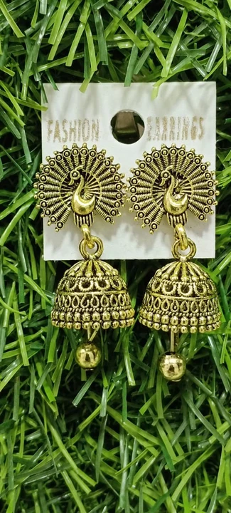 Gold earrings artificial uploaded by business on 7/16/2023