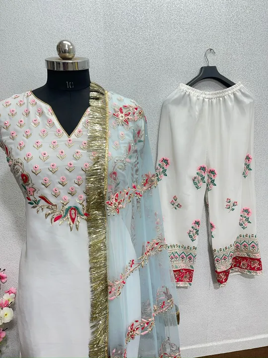 DESIGNER HEAVY FUAX GEORGETTE SUIT SET WITH DIMOND HAND WORK uploaded by Shreeji fashion on 7/17/2023