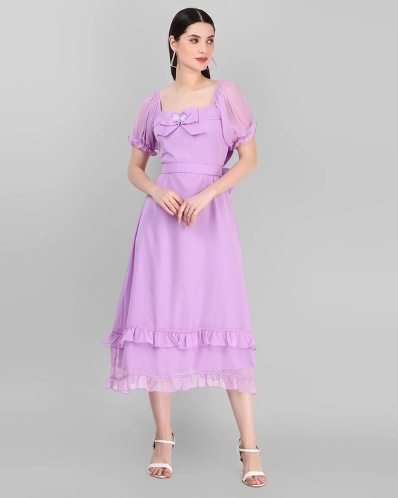 Post image A puffed sleeves mid length dress with a bow at the front-back and pearl work in the front. This georgette fabric dress gives you a great confidence to wear at any party.