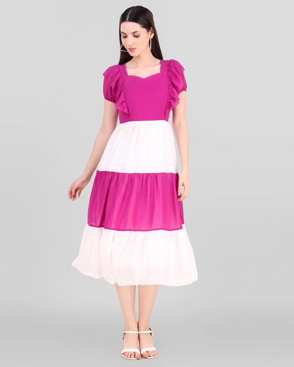 Post image A multicolor puffed sleeves mid length dress with rayon fabric lining. Sweetheart shape neck and ruffle detailing on shoulders.