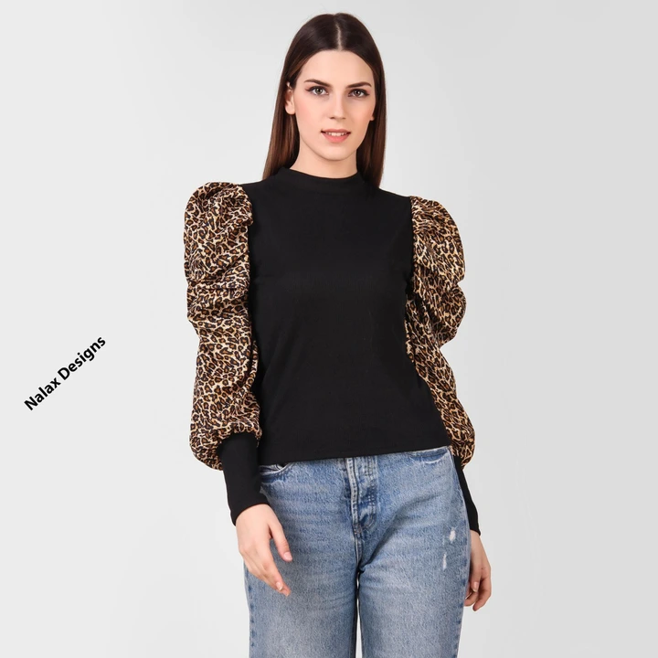 Tiger print puff sleeve top uploaded by Nalax Designs on 7/17/2023