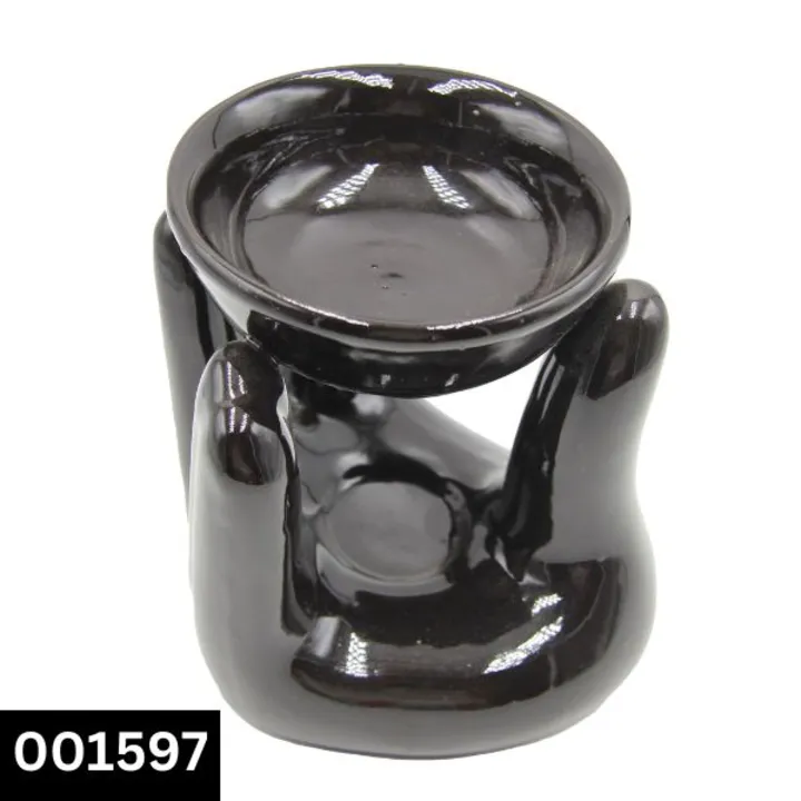Hand shape black ceramic electric aroma Diffuser with C.O.D Available  uploaded by The palak trading company on 7/19/2023