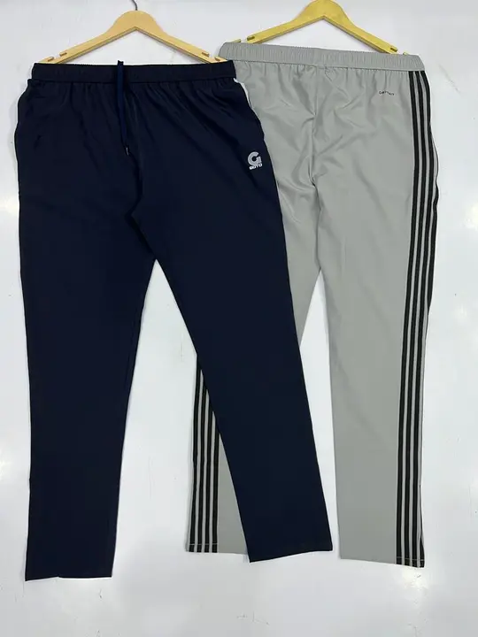 Ns 8% lycra 4 strip trackpants for mens uploaded by Showroom quality sports wear manufacturers  on 7/20/2023