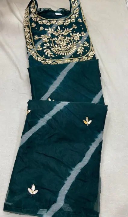 💕New launch lehriya kurti 💕
Fabric organza silk 
Hand work on neck 
Bijiya lase on hand 
 uploaded by Gotapatti manufacturer on 7/22/2023