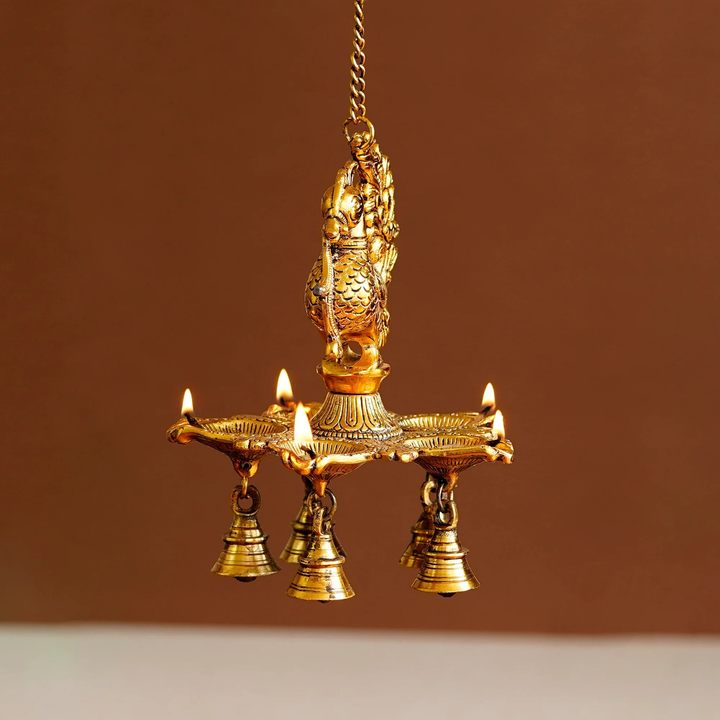 🪔Five Wicks Decorative Peacock Diya With Bell Metal Wall Hanging With Chain
🪔 uploaded by business on 7/22/2023