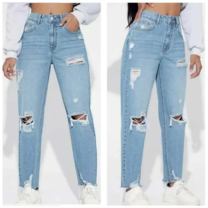 Ripped high rise jeans  uploaded by The Style Club on 7/24/2023
