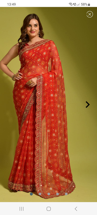 Orange net saree uploaded by Navya clothing on 7/26/2023