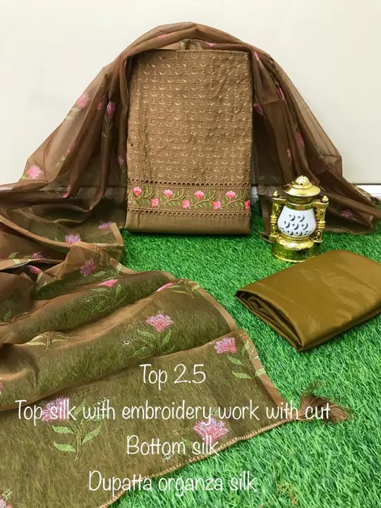*Top* Silk with Embroidery  Work with cut Work 2.50 mtr

*Bottom* Silk 2 mtr

*Dupatta* Organza Silk uploaded by Lk fashion on 7/26/2023
