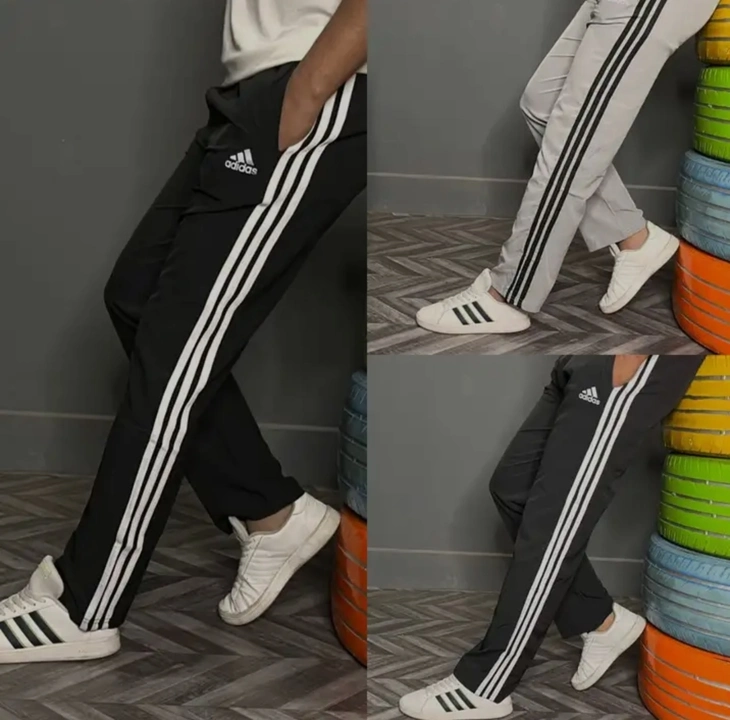 Ns multi color side strip track pants size.M.L.XL. uploaded by business on 7/26/2023